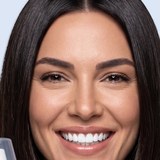 Portrait of a woman smiling with white teeth